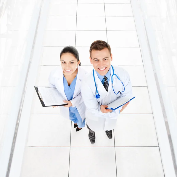 Man and woman doctors — Stock Photo, Image