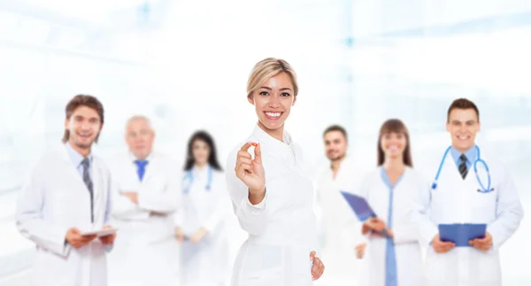 Doctor with medical team — Stock Photo, Image