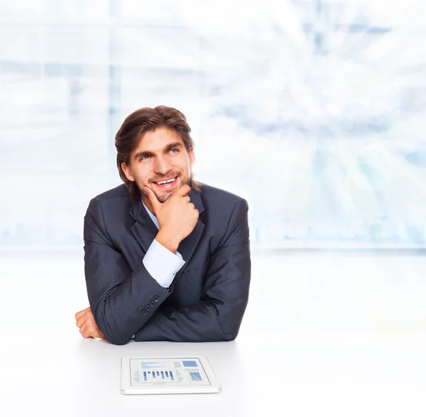 Businessman looking at white cloud — Stock Photo, Image