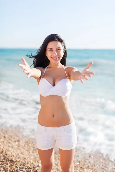 Woman welcoming on beach — Stock Photo, Image