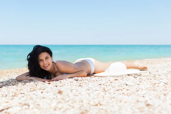 Woman sunbathing — Stock Photo, Image