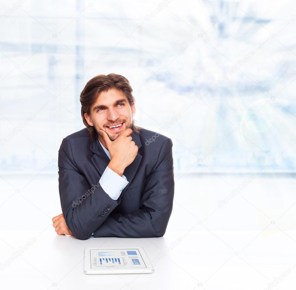 Businessman looking at white cloud