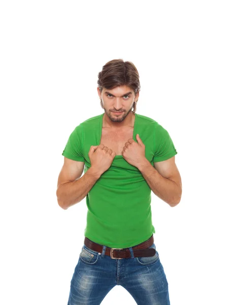 Uomo tirando t-shirt verde — Foto Stock