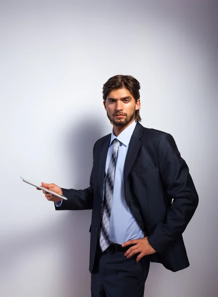 Business man holds tablet — Stock Photo, Image