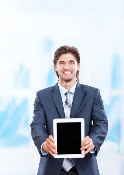 Business man holds tablet — Stock Photo, Image