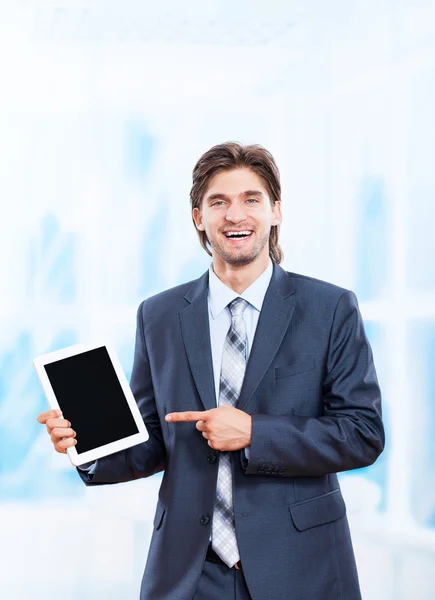 Business man holds tablet — Stock Photo, Image