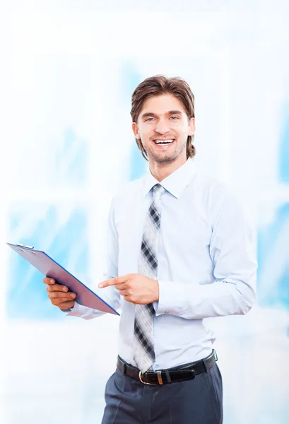 Hombre de negocios con portapapeles — Foto de Stock