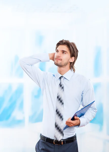 Business man with clipboard — Stock Photo, Image