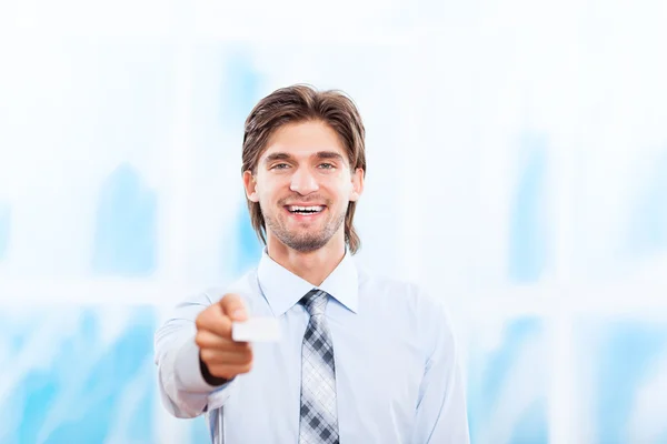 Business man giving card — Stock Photo, Image