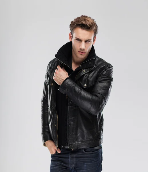 Serious man wearing leather jacket — Stock Photo, Image
