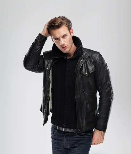 Serious man wearing leather jacket — Stock Photo, Image