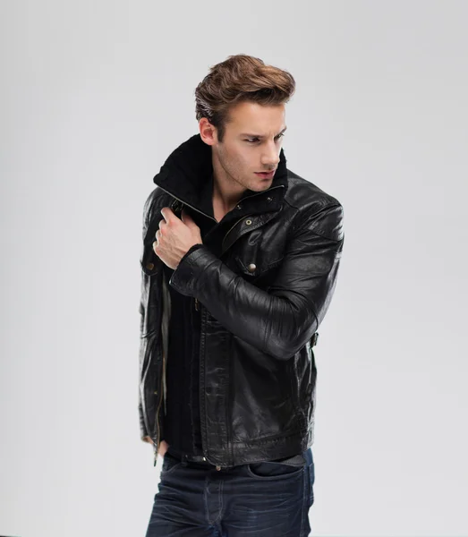 Serious man wearing leather jacket — Stock Photo, Image