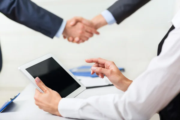 Businesswoman touching digital tablet — Stock Photo, Image