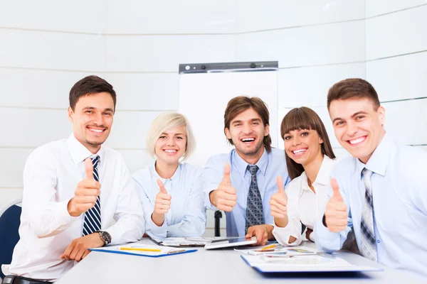 Business people hold  thumb up — Stock Photo, Image