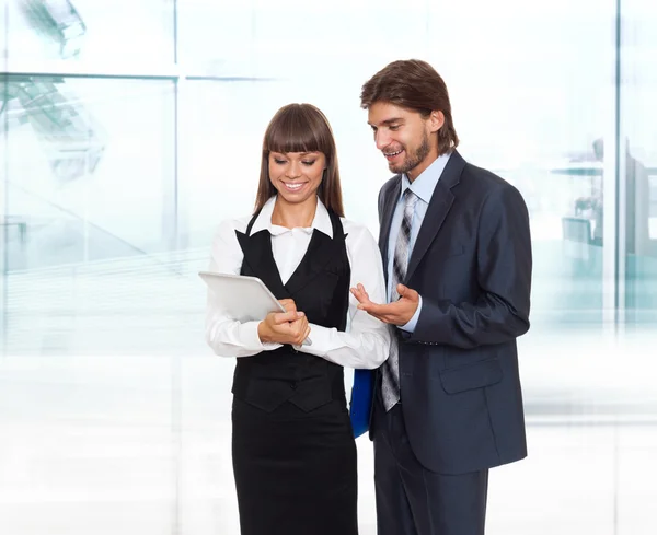 Businesspeople using table — Stock Photo, Image