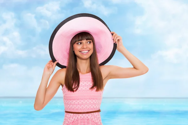 Woman wear pink dress and hat — Stock Photo, Image