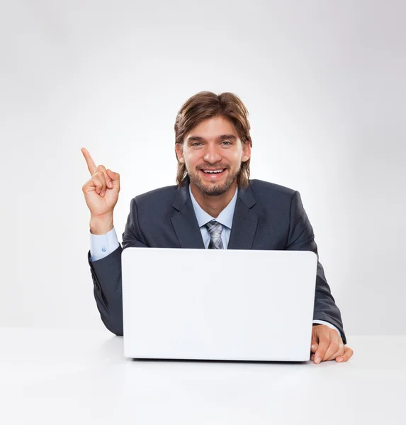 ノートパソコンを持つビジネスマン ロイヤリティフリーのストック画像