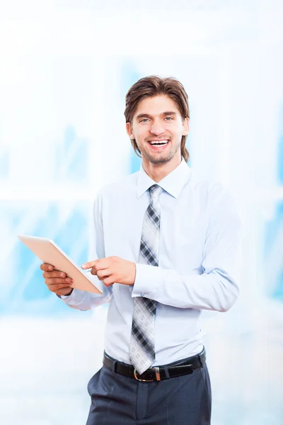 Business man using tablet pad Stock Picture