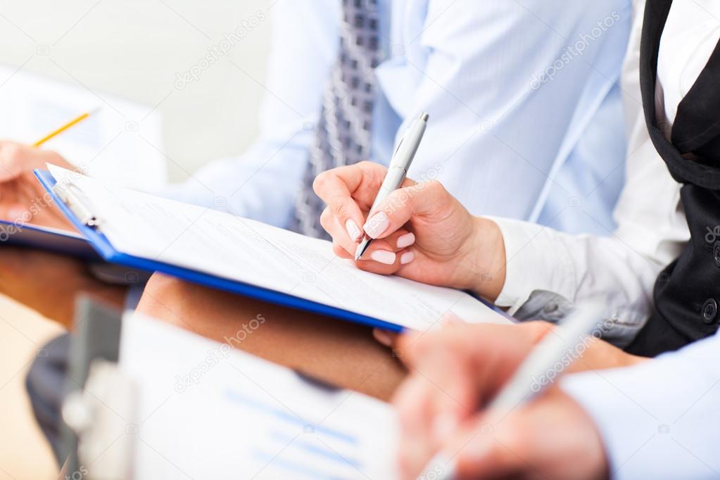 Business people writing