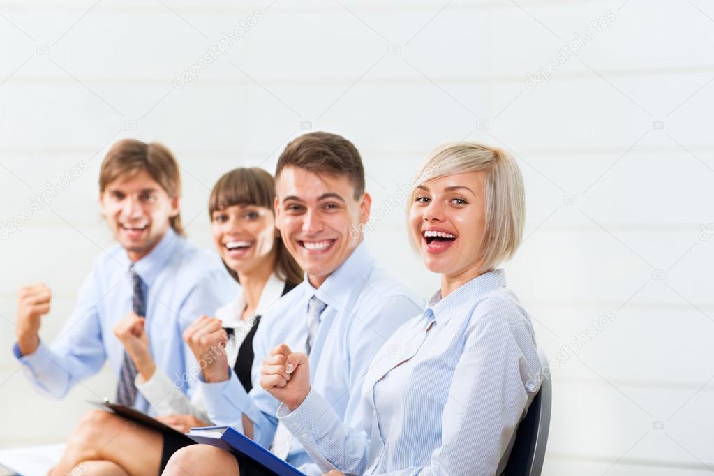 Portrait Of A Smiling Mature Businessman Sitting