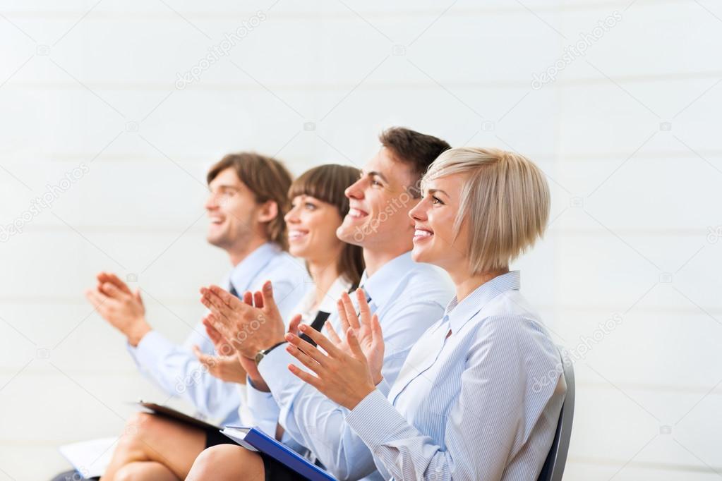 Business people applauding