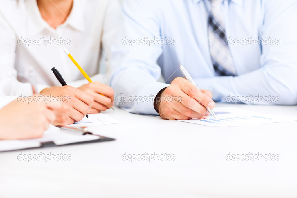 Business people hands writing