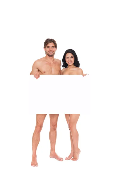 Couple en maillot de bain montrant tableau blanc — Photo