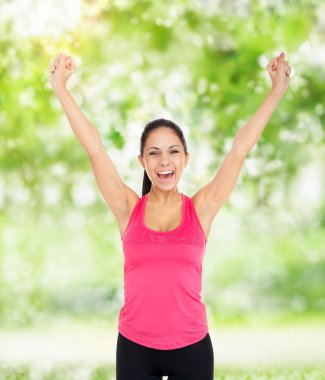 Spor fitness kadın kol kaldırdı