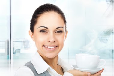 iş kadını ile kahve fincanı