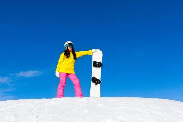 Snowboarder standing hold snowboard — Stock Photo, Image