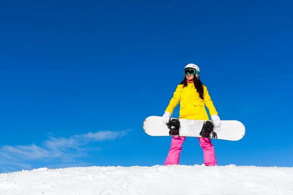 Snowboarder standing hold snowboard — Stock Photo, Image