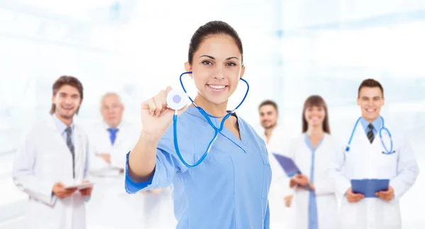 Female surgeon doctor with team — Stock Photo, Image