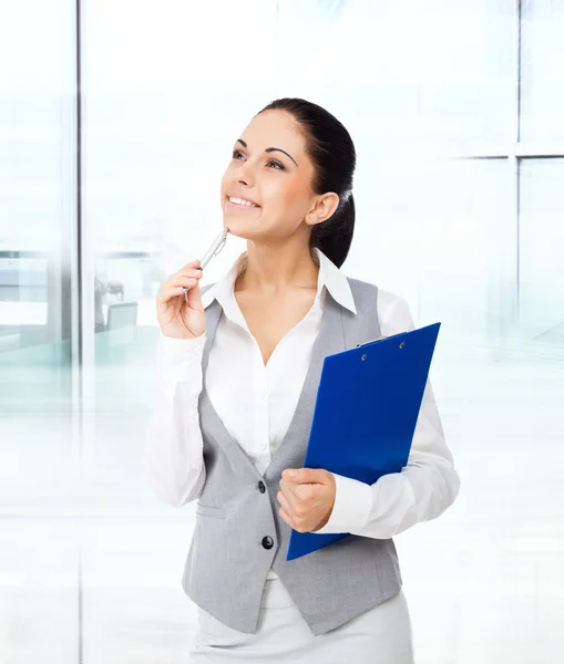 Businesswoman thinks looking up — Stock Photo, Image