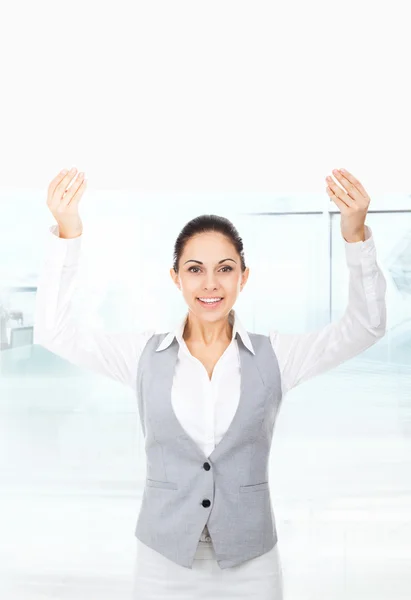 Businesswoman holding blank white card board — Stock Photo, Image