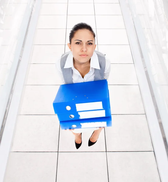 Tired businesswoman folder stack — Stock Photo, Image