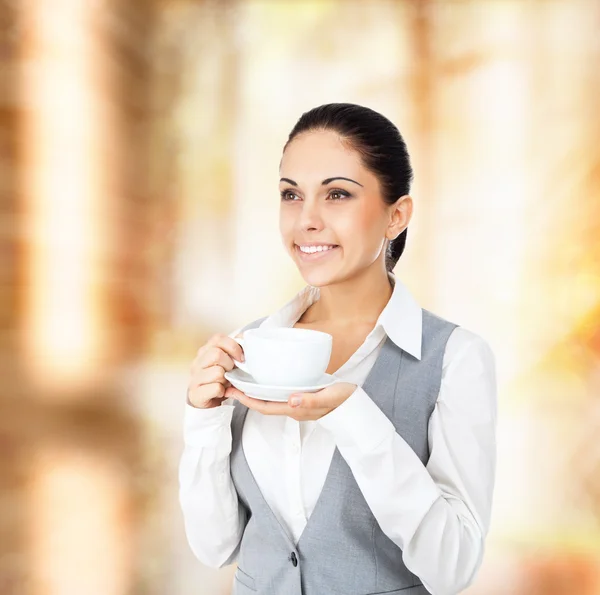 Γυναίκα των επιχειρήσεων με το φλυτζάνι του καφέ — Φωτογραφία Αρχείου