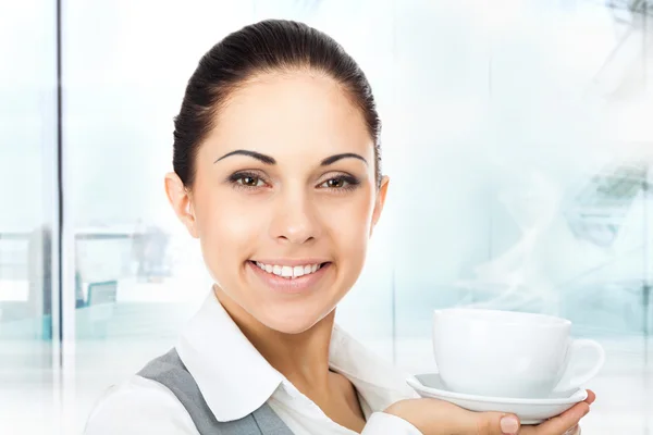 Businesswoman with coffee cup — Stock Photo, Image