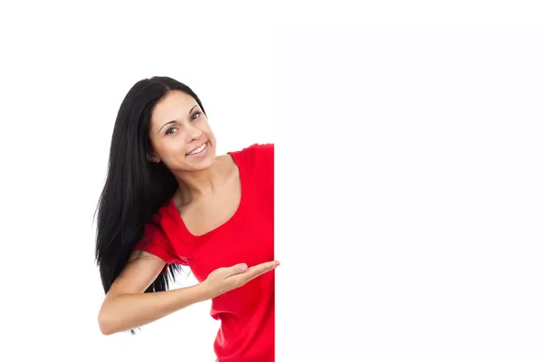 Joven mujer sosteniendo tablero en blanco — Foto de Stock