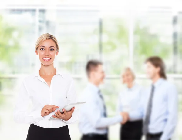 Businesswoman holds tablet pad computer — Stock Photo, Image