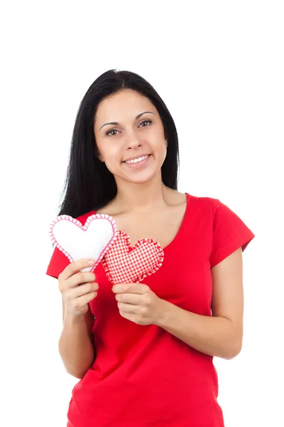 Chica atractiva sosteniendo dos corazones — Foto de Stock