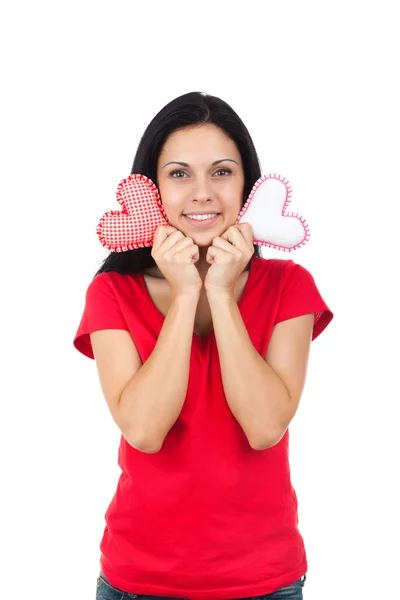 Attractive girl holding two hearts — Stock Photo, Image