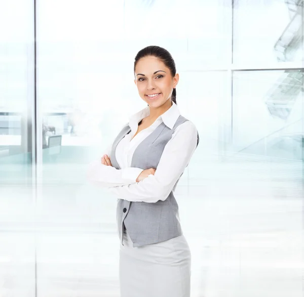 Businesswoman with folded hands — Stock Photo, Image