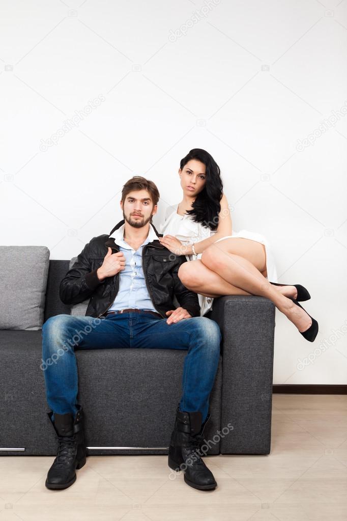 Couple flirting on couch