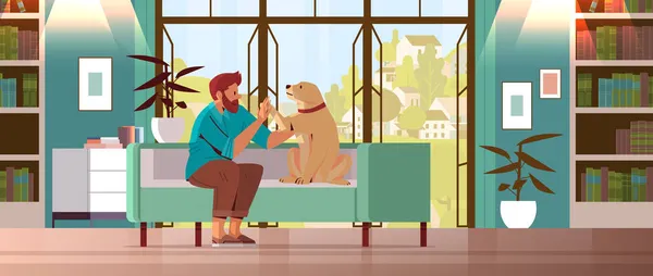 Joven pasar tiempo con perro propietario masculino y lindo animal doméstico amistad con el concepto de mascota — Vector de stock