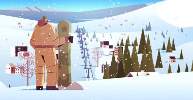 Snowboard sporcusu ile birlikte snowboard sporcusu kış tatili aktiviteleri yapıyor.