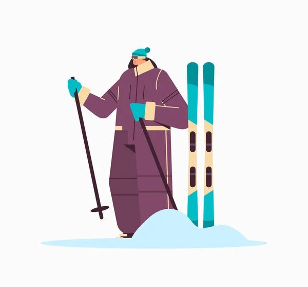 Esquiadora mujer deportista esquí haciendo actividades concepto de vacaciones de invierno longitud completa — Vector de stock
