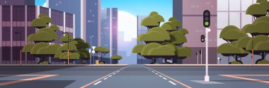 Yol kavşağı ve trafik ışığı olan boş cadde şehir binaları gökyüzü çizgisi modern mimari manzarası