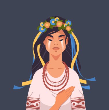 Ukrayna 'yı Rusya' dan kurtarmak için Ukrayna 'ya dua eden mavi çiçekli geleneksel kostümlü üzgün Ukraynalı kadın.