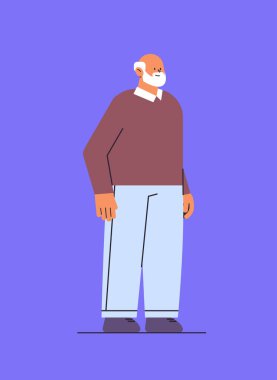 Giysiler içinde son sınıf öğrencisi. Büyükbaba ayakta duruyor. Erkek çizgi film karakteri gibi duruyor.