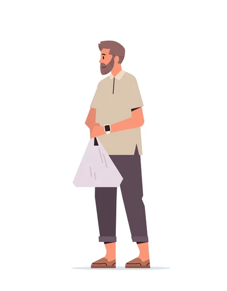 縦フルサイズベクトルイラストを歩きながらショッピングプラスチックバッグを保持スマートウォッチ付きカジュアル男 — ストックベクタ